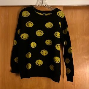 L black smiley face sweater